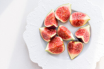 chopped figs on a white ceramic plate