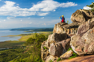 Young girl hiking on the mountain, Nam-Phong national park, Khon-Kaen province, Thailand.