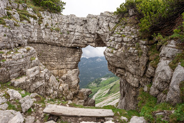 View of the mountains from rock window at the Loser peak in Austrian Alps. Dead Mountains (Totes Gebirge)