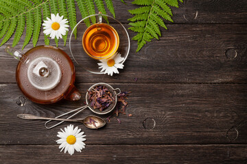 Herbal tea in teapot and cup