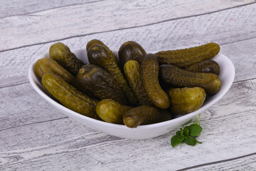 Pickled cucumbers heap in the bowl