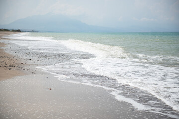 Beach in Sicily Italy. Mediterranean sea coast. Travel, summer vacation, tourism, recreation