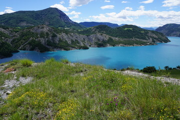 panoramic view of the Serre Ponçon lake in the french Alps