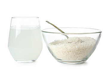 Glass of rice water on white background