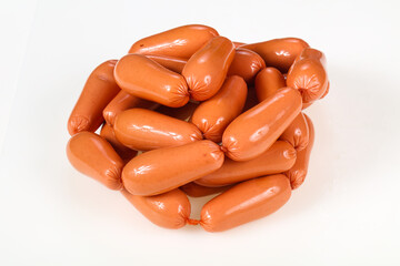 Tasty meat sausages over white background