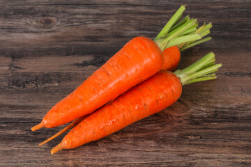 Three Young fresh ripe carrot