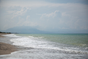 Beach in Sicily Italy. Mediterranean sea coast. Travel, summer vacation, tourism, recreation