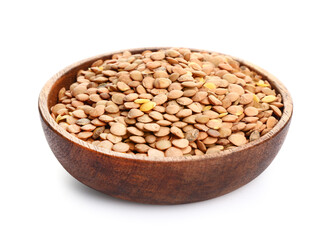 Plate with raw lentils on white background