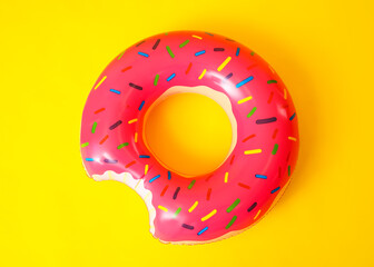 Inflatable ring on color background