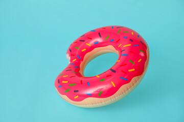Inflatable ring on color background