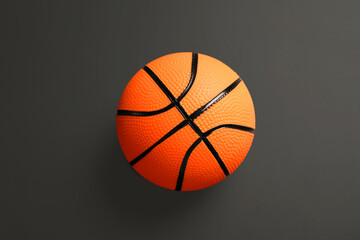Ball for playing basketball game on dark background
