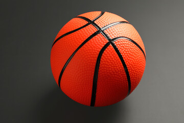 Ball for playing basketball game on dark background