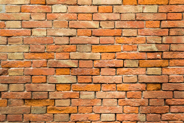 A red brick wall texture of an old building found in Venice, Italy