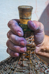Hand of winemaker close up