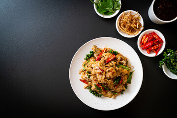 stir fried holy basil with fish and herb