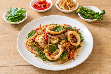 stir fried holy basil with octopus or squid and herb