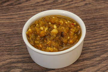Green spicy sauce in the bowl
