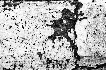 Texture of a concrete wall with cracks and scratches which can be used as a background