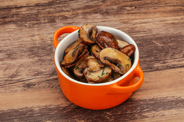 Roasted champignon with herbs and spices