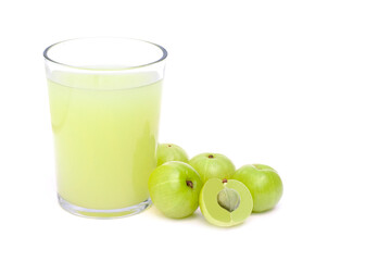 Closeup fresh organic Indian gooseberry fruits ( Amla ) and glass of gooseberry juice isolated on white background. Antioxidant fruit, herbal medicine plant and healthy drinks concept. 