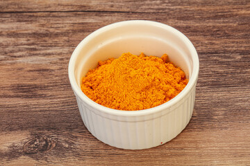 Tumeric powder in the bowl