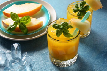 Refreshing drinks and citrus juices  with ice cubes, mint and watermelon. Summer concept 