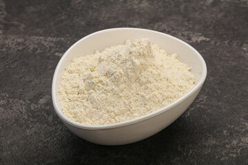 Wheat flour heap in the bowl