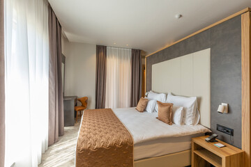 Interior of a luxury hotel bedroom in mountain hotel resort