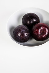 Plums in bowl