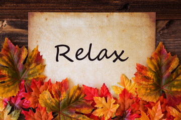 Grungy Old Paper With English Text Relax. Colorful Autum Decoration With Leaves