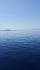 Serene blue horizon view of a sea coast in Bali