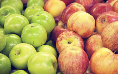 Close-up of apples on display in market