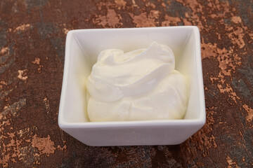 Sour cream in the bowl