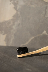 Bamboo Toothbrush With Black Toothpaste