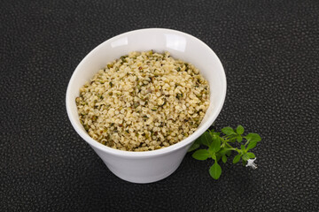 Peeled hemp seeds in the bowl