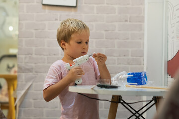 Do it yourself DIY toys out of recycled materials plastic bottle, cup using hot melt glue gun....