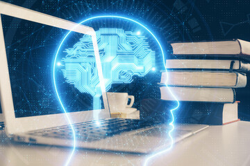 Double exposure of work space with computer and human brain drawing hologram. Brainstorm concept.