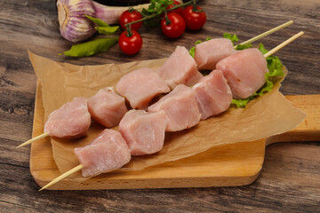 Raw pork meat skewer for grill