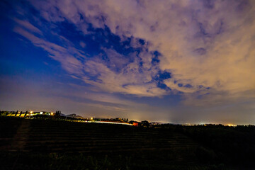 Fototapeta premium Evening in the vineyard of Rosazzo during a moon eclipse