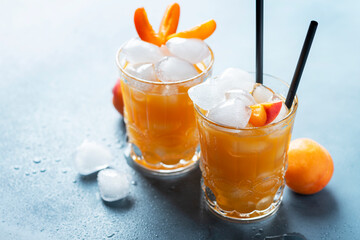 Summer juice with apricots and ice
