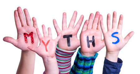 Kids Hands Holding Colorful English Word Myths. White Isolated Background