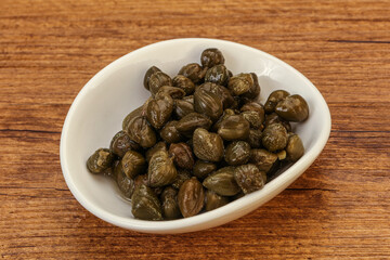 Tasty capers in the bowl