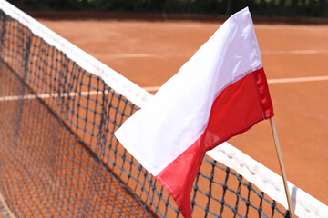 Polish flag and tennis court als background.