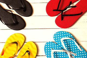 flip flops on wooden background
