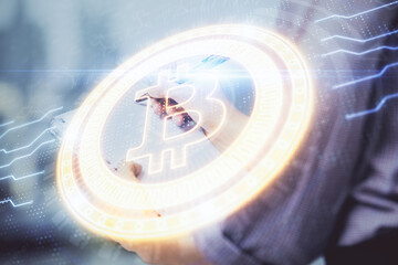 Cryptocurrency hologram over woman's hands writing background. Concept of blockchain. Double exposure