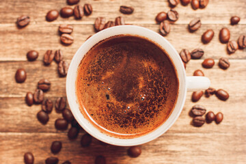 cup of coffee with beans