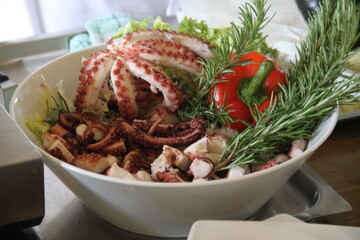 Roasted purple octopus tentacles restaurant