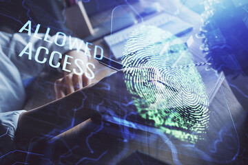 Blue fingerprint hologram over hands taking notes background. Concept of security. Double exposure