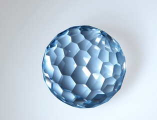 Large faceted glass sphere on a white background.