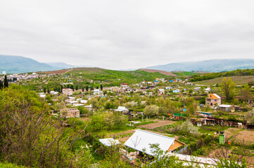 Fototapeta na wymiar Small village located in mountains